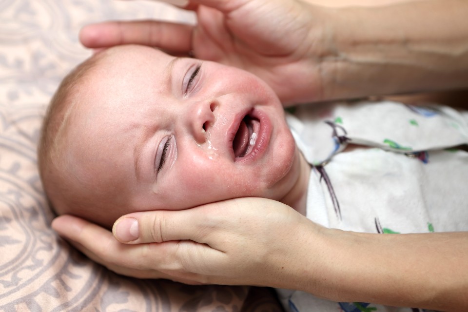 Baby hoest in slaap